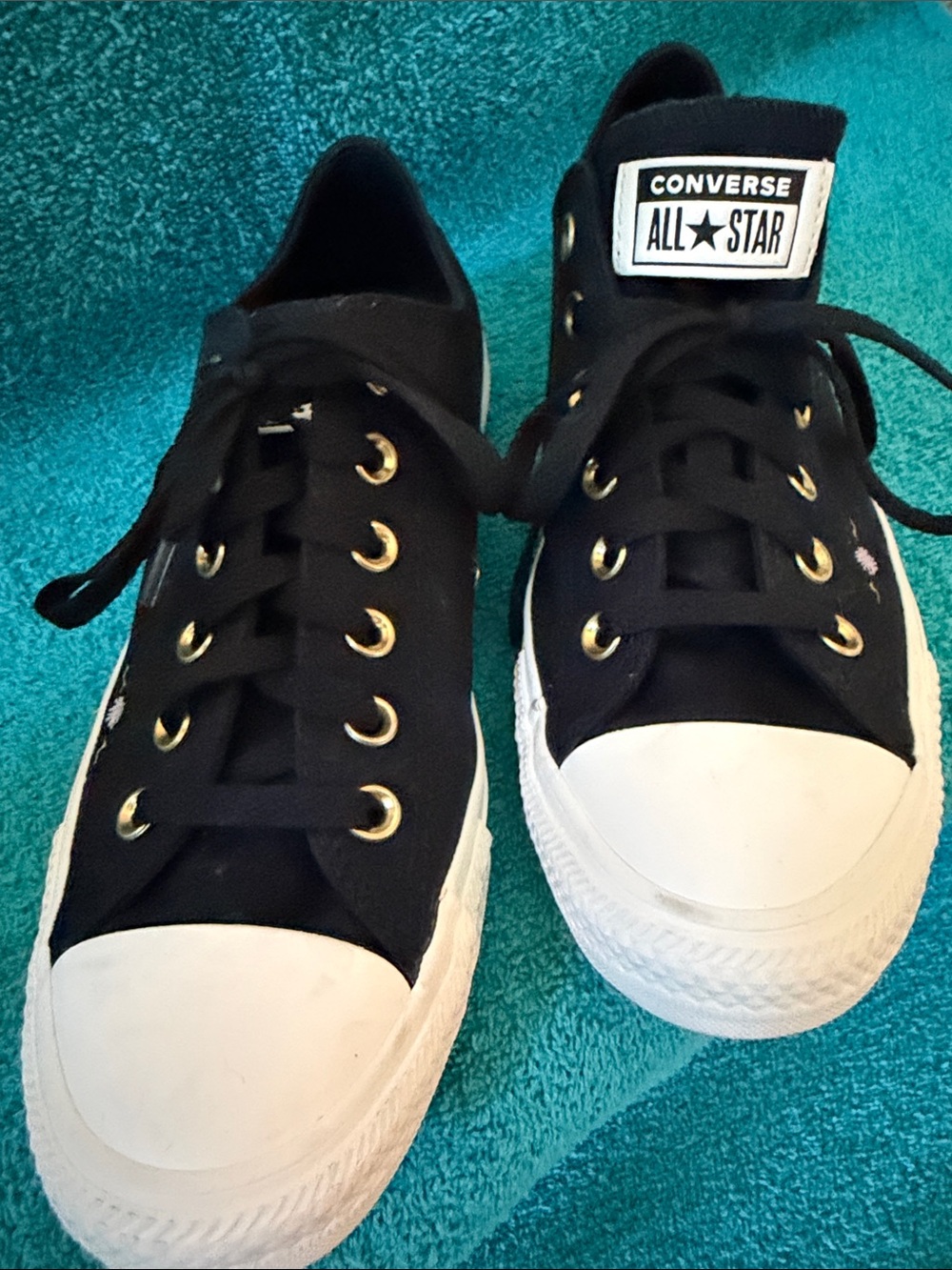 Converse Woman’s Black and White Low Top Sneakers with Gold Eyelets and Flowers